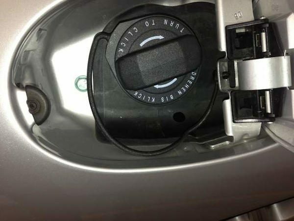 Gas Cap Compartment: Drain Hole is clearly visible